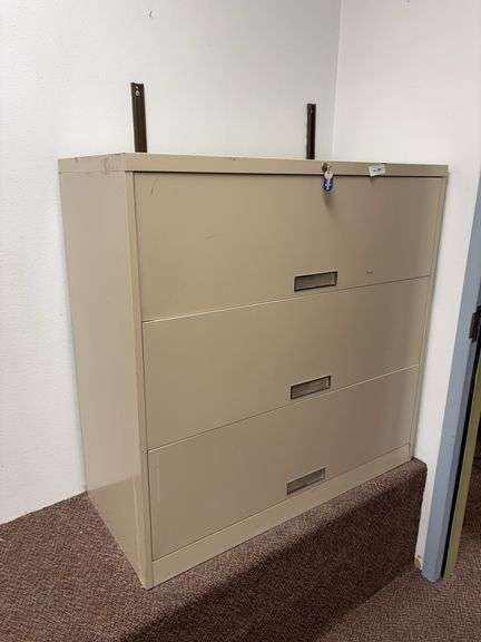 Three drawer lateral file with key image