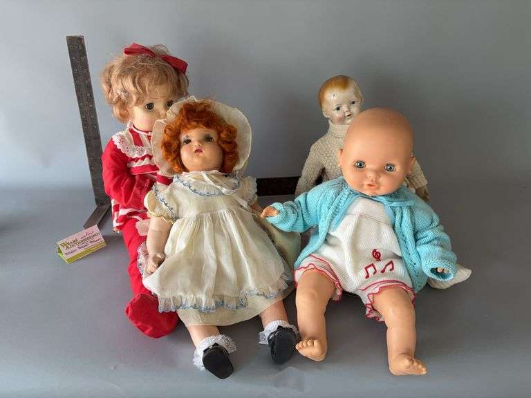Four baby dolls-composition, rubber, hard plastic Horseman, Famosa image
