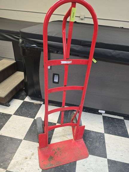 Red 2 wheeled hand truck, solid wheels image