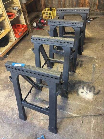 Four plastic husky brand sawhorses image