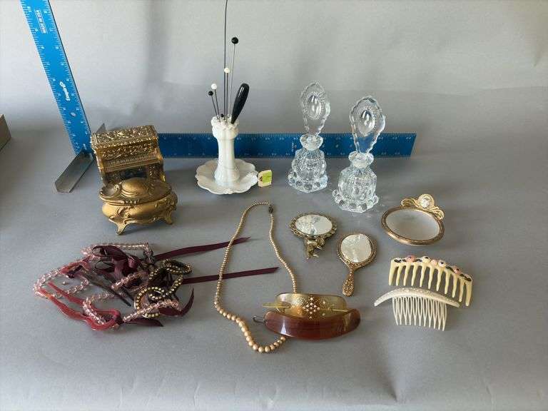 Dresser boxes, hat pins and holder, pair perfumes, hard plastic hair assessories image