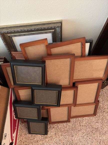 At least a bazillion picture frames. The size you need is in here, maybe 2!