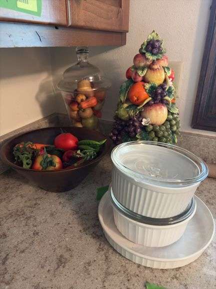 Various fruit decor and three casserole dishes
