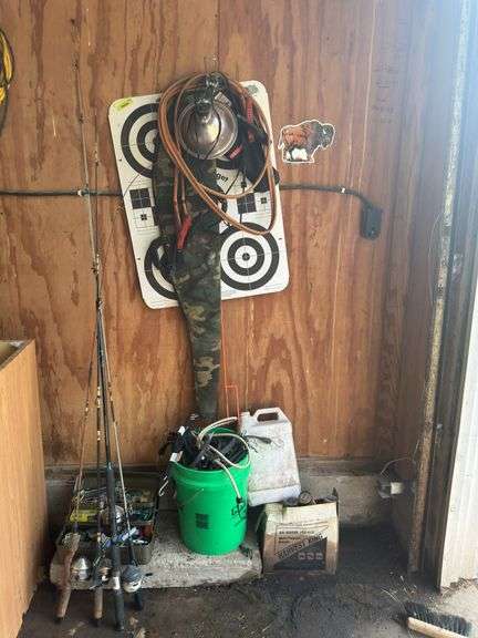 Target and stand, jumper cables, gun case, rubber tarp straps, fishing rods and tackle image