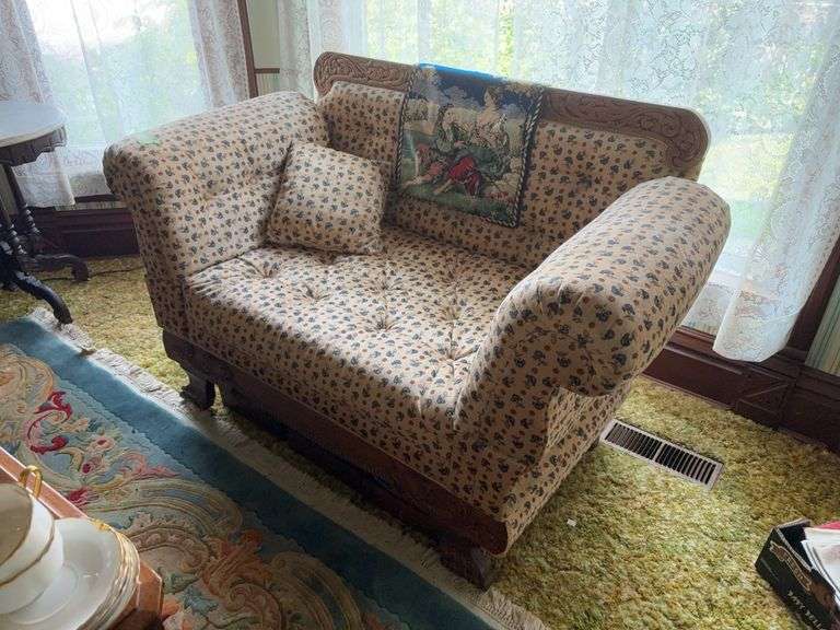 60” settee with oak trim on wooden wheels image
