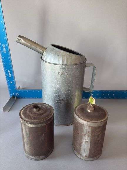 4 quart oil can and 2 other cans image