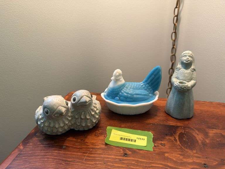 Two Isabel Bloom figures and blue milk glass hen on nest See photos for condition image