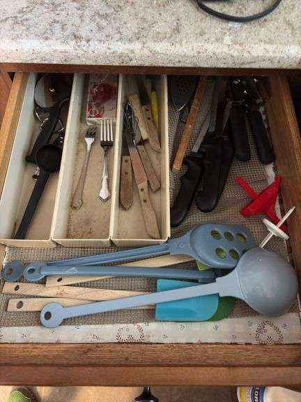 Kitchen utensils, plastic storage containers, cleaning supplies “E” cupboards