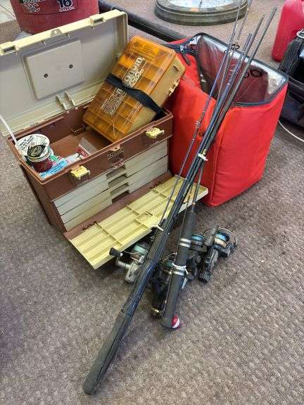 Soft sided cooler, fishing poles and reels, line image
