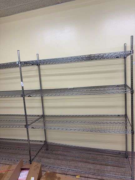 Two storage racks hooked together so no center poles on one, shelves 24” deep, 58” long image