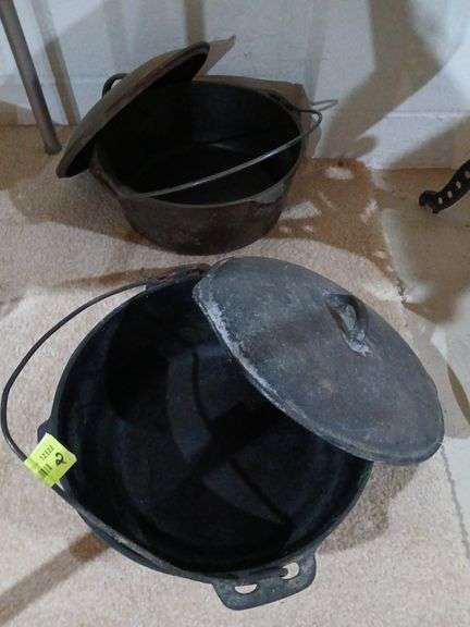 (2) 10" chicken frying Dutch ovens, one is a Lodge