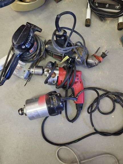 Drill, sander, router and drill image