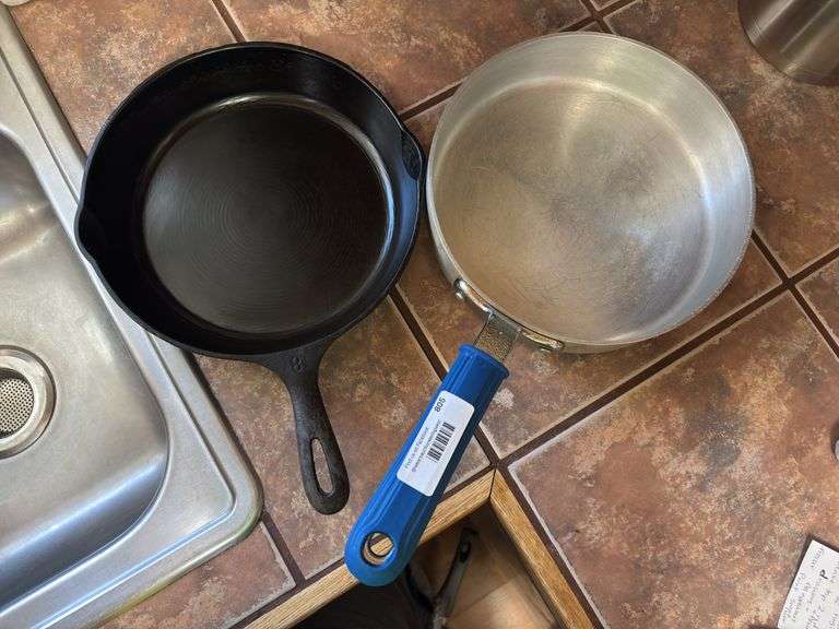Number eight Wagner 10 1/2 inch cast-iron skillet and Eagle Wear P-3 skillet commercial grade image