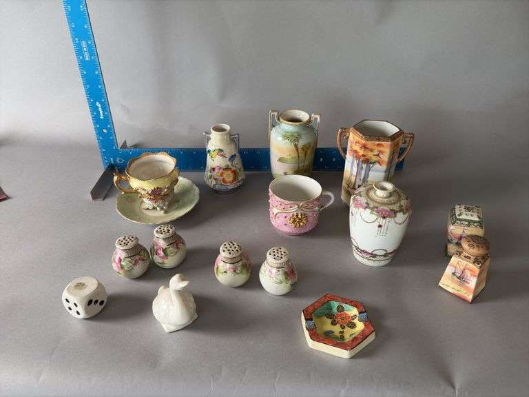 Hand painted cups and saucers, salt and peppers image