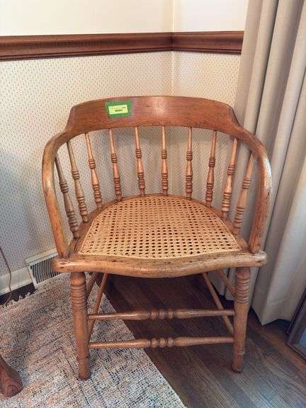 Captains chair with cane seat, does have wood separation, see photos Great decor piece! image