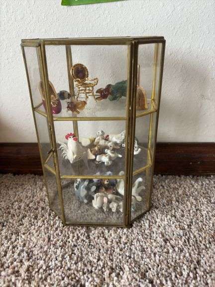 9” tall glass curio cabinet with miniatures image