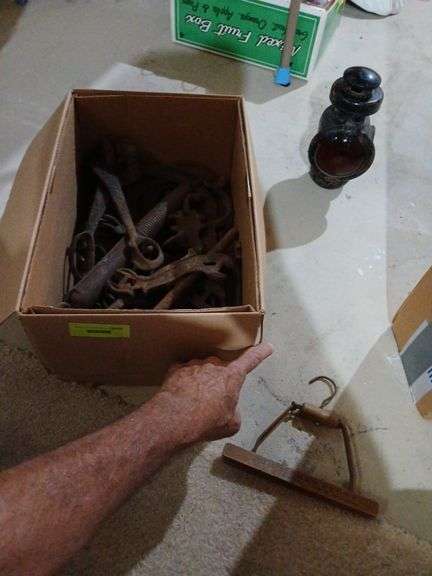 Antique car headlight, ear notcher, horse shoes, horse bits and wrenches etc... image
