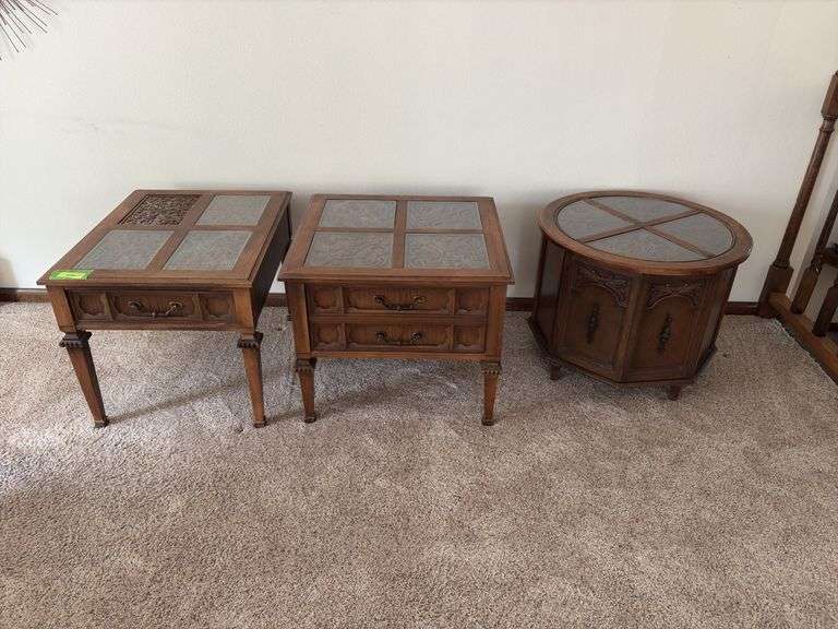 Three piece living room table set One side table is missing a glass pane image