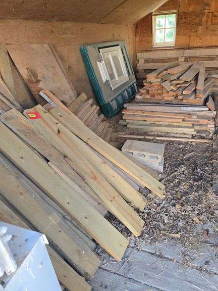 LG qty of dimension lumber 4' and under mostly wolmanized, south half of shed image