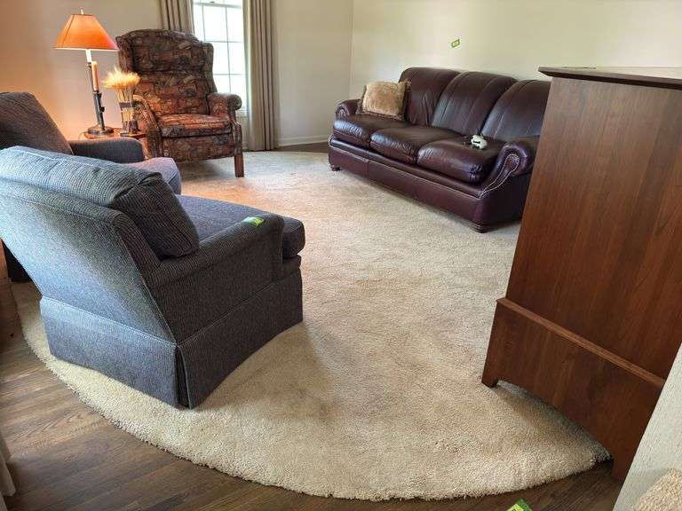 Approx 14-15’ round area rug Come late or plan to wait, this is under all the living room furniture! image