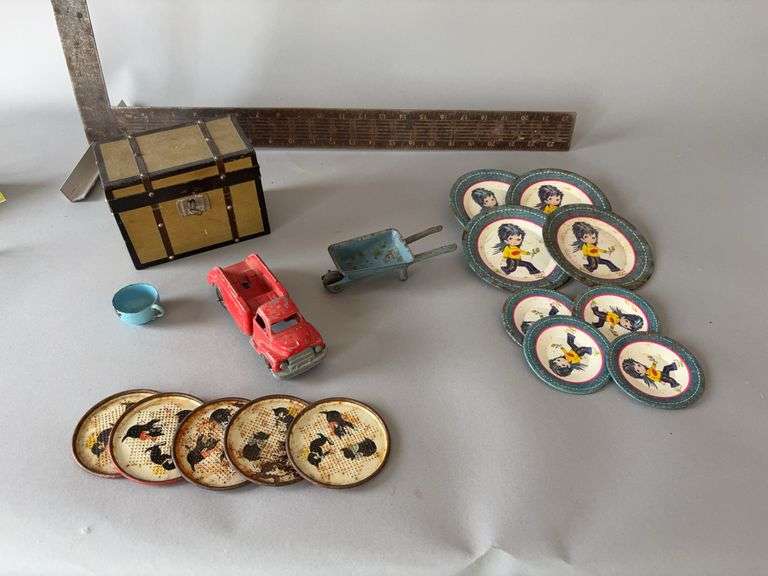 Children’s toys-dishes, wheelbarrow, truck, trunk image