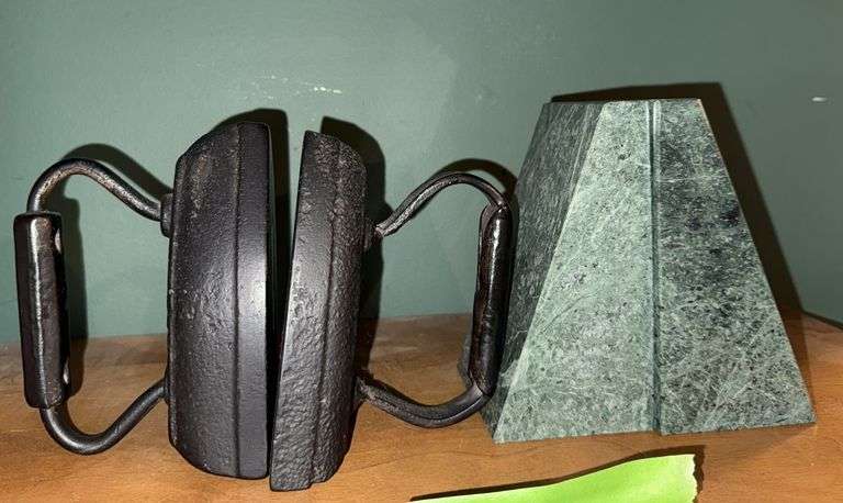 Sad irons and stone bookends image