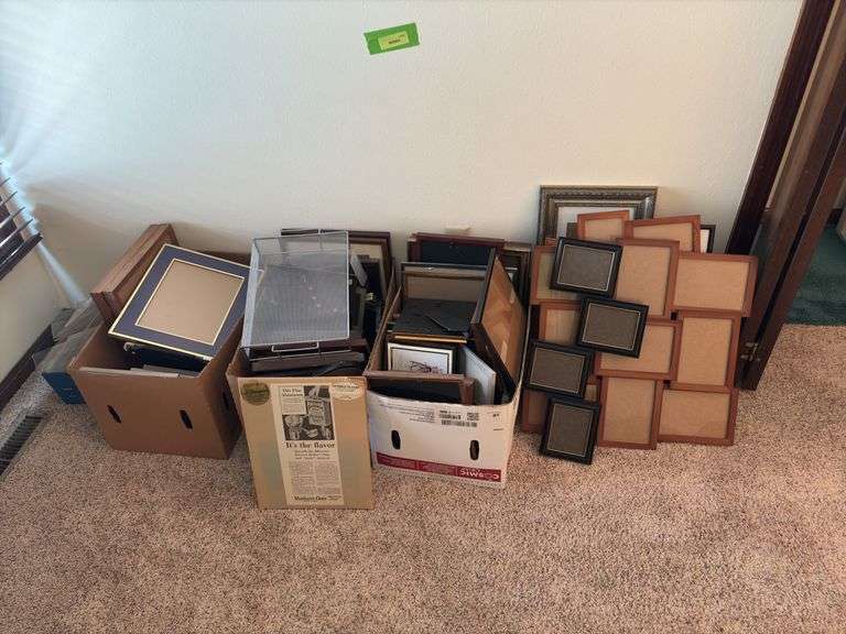 At least a bazillion picture frames. The size you need is in here, maybe 2! image