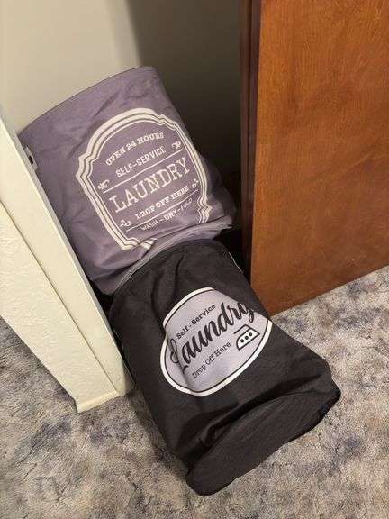 Two canvas laundry totes, huge assortment of nonslip hangers, closet organizing systems, vintage luggage image