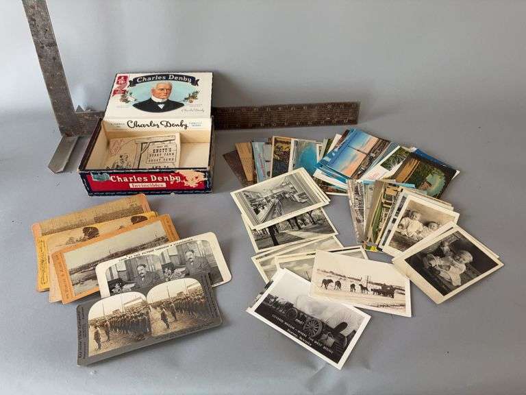 Cigar box full of stereoscope cards and postcards image