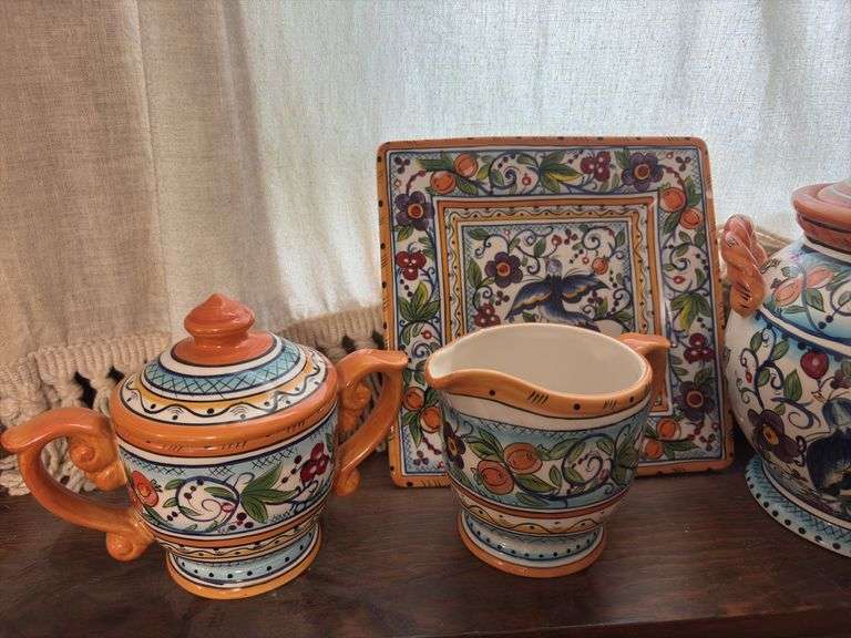 Decorative ceramic canisters with matching cream & sugar