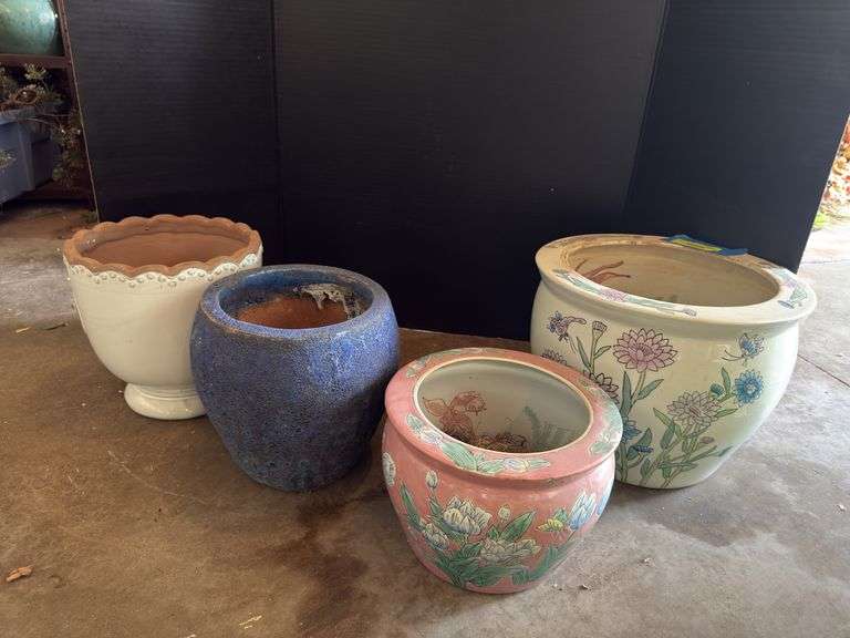 Four planters includes two fish bowls image