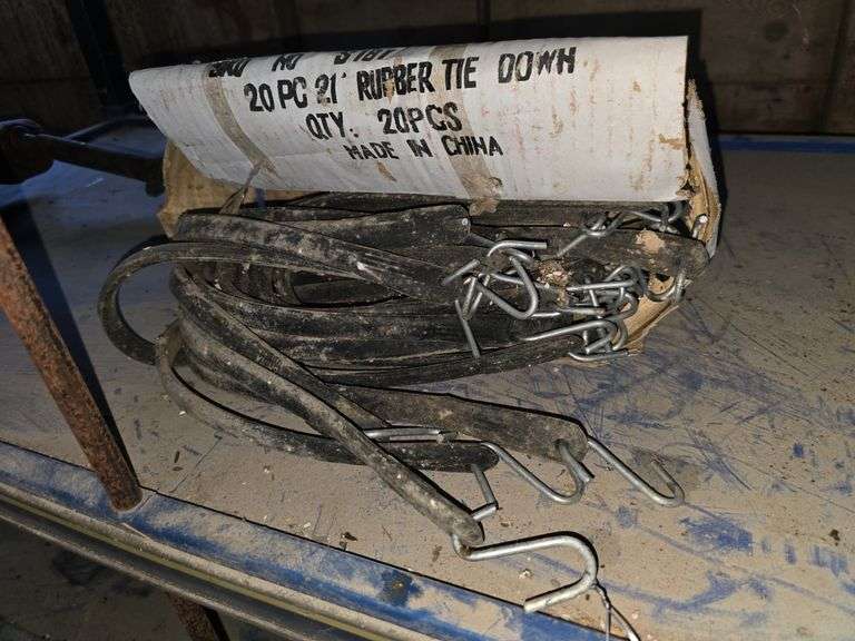 Box of new rubber tarp straps image