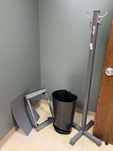 Coat rack, trash can-no lid, roller dolly-no top, cutting mat image