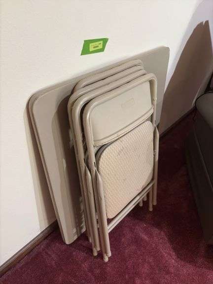 Four Cosco folding chairs and matching table image