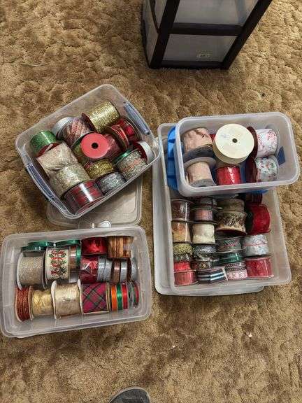 Several rolls of ribbons in totes image