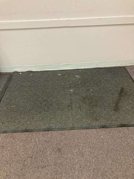 Commercial rug 74x46, needs cleaned image