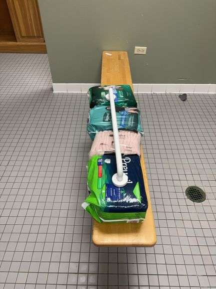Wood bench 66” long, grab bar-bring tools to remove from floor; Depends image