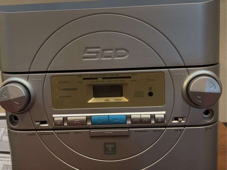 Trutech 5 cd player/AM/FM, speakers and stand.