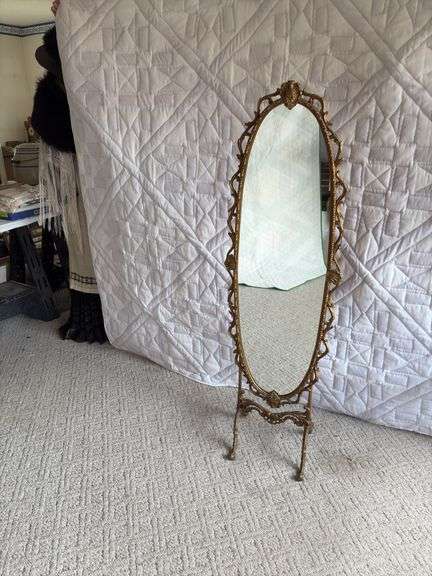 Cast iron frame free standing mirror. 56” tall, 17” wide. So COOL image
