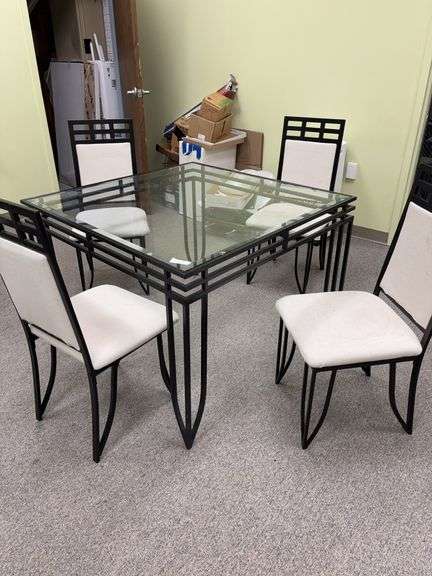 Glass top table 42” square and 4 chairs, chairs have stains image