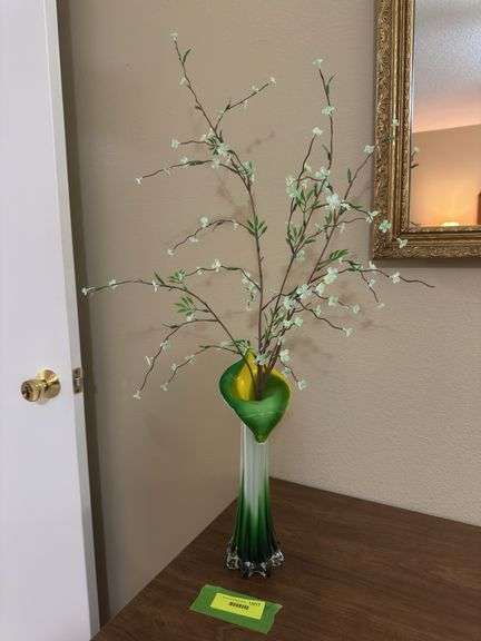 Jack in the Pulpit style glass stretch vase and genuine plastic flowers, not imitation plastic but genuine!!!