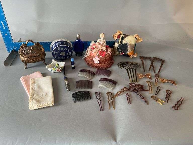 Pin cushion doll, hair combs, metal ring box, powder box etc... image