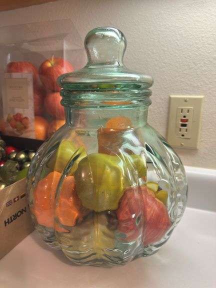 Artificial fruit, real picture and large jar