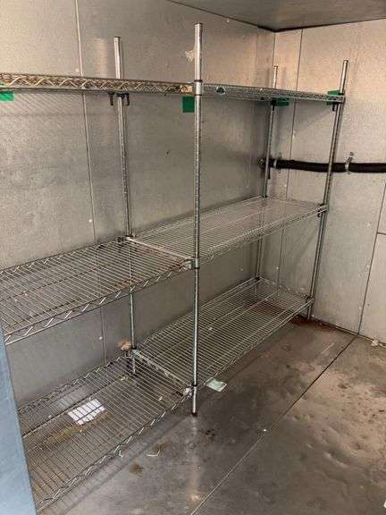 Four metal storage racks, these have been in cooler so some small rust spots image