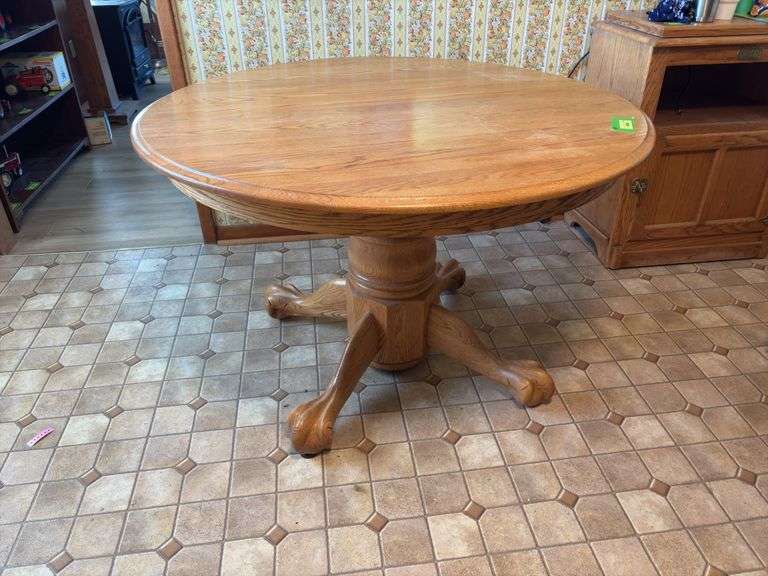 48” round oak pedestal table image