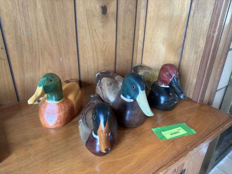Four wooden decoys includes a Ducks Unlimited image