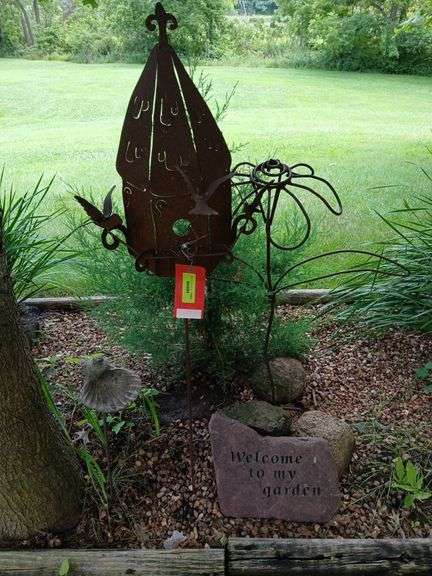Metal yard art and Welcome to my Garden stone image