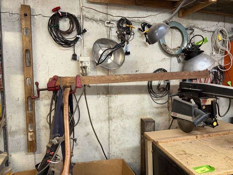 Cords, toolbox, clamp, axe, level etc... image