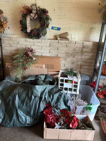 Christmas tree in bag, wreathes, lights, etc image