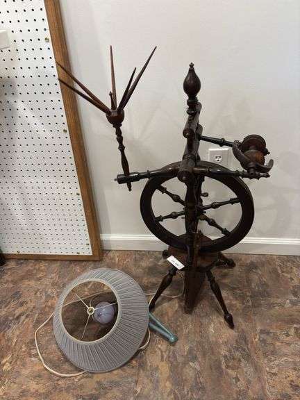 Antique spinning wheel, blue wall mount lamp image